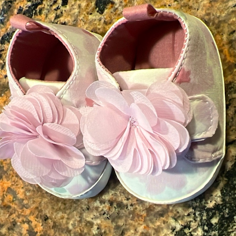 Newborn pink and white shoes